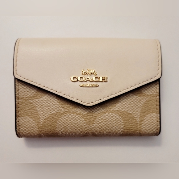 Coach Handbags - Coach Women's Mini Cream and Tan Wallet In Signature Leather Design